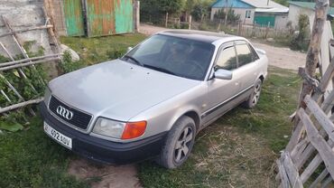 муссо каранда: Серебристый седан Audi с черной крышей и спойлером на багажнике