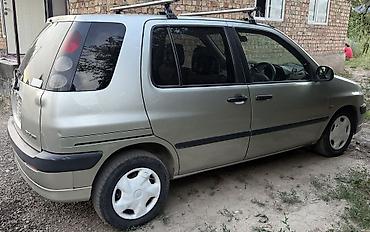 kirgiz auto: Toyota Raum: 2000 г., 1.5 л, Бензин — 6