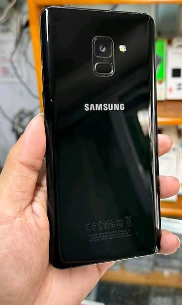 telefon samsung a8: Samsung Galaxy A8 2018, 32 GB, rəng - Qara, Barmaq izi — 1