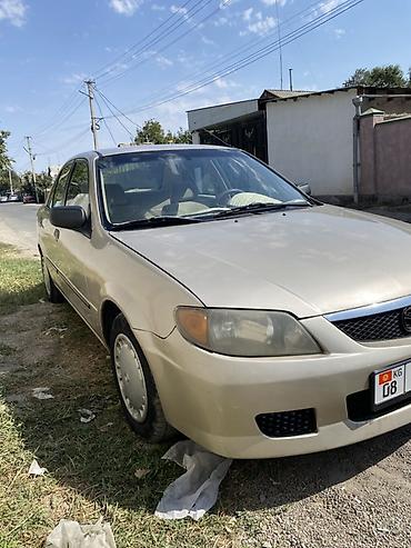 mazda 2004: Mazda 323: 2003 г., Автомат, Бензин, Седан — 3
