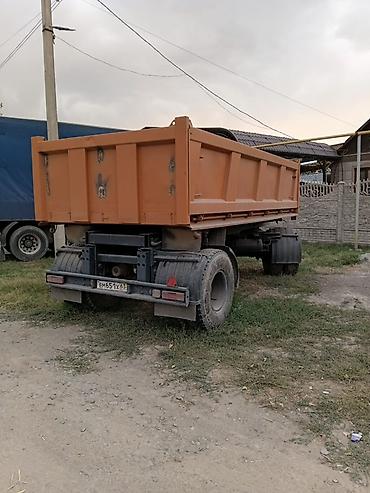 юмз донголок: КамАЗ 15 000$ 
Прицеп 850 000 сом — 2