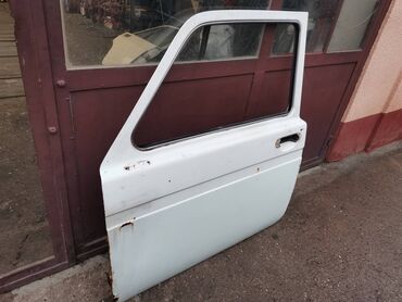 Auto delovi: Dodatni opis Vrata leva Lada 21213,21214 Niva u beloj boji. Polovna — 2