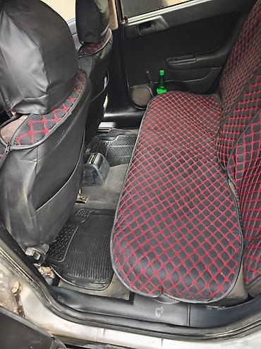 Opel: Opel Astra Caravan (universal) – gümüş rəngli kuzov, 5 qapı, dam — 4