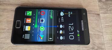 телефон 2500: Samsung I9100 Galaxy S Ii | 16 ГБ | цвет - Черный | Наушники, Зарядное устройство, Кабель | С документами | Слот для SD карты