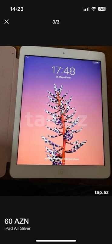 ipad air: Gümüşü rəngdə Apple iPad Air1 planşeti. Youtubu safariden açır ios