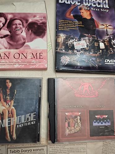 disk satisi: Musiqi CD/DVD diskləri toplusu Janr və ifaçılar: - Rock və pop: Dire — 9