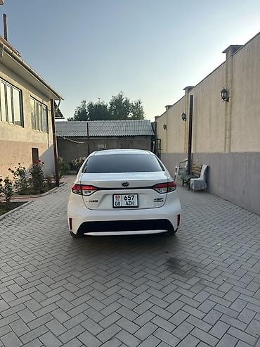 королла 2015: Toyota Corolla: 2023 г., 1.8 л, Автомат, Гибрид, Седан — 3