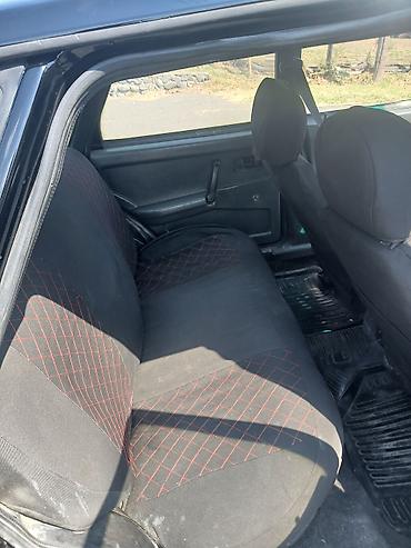 avto satış saytları: LADA Samara (VAZ 21099) – sedan, qara rəng. Xüsusiyyətlər: - Kuzov: 4 — 2