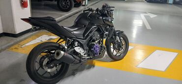Мотоциклы: Мотоцикл Yamaha MT-03 в черном цвете. Подходит для ежедневных поездок