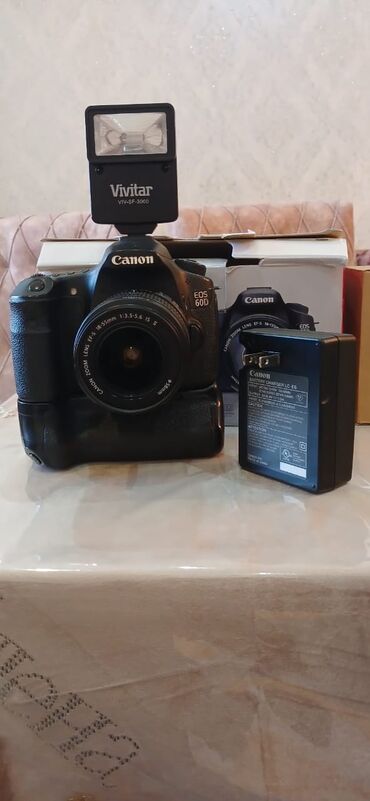 canon eos 60d qiymeti: Foto.CANON 60 D.Yeni kimidir,çox az işlənib.Heç bir problemi