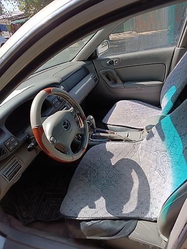 tayota vitz: Mazda : 2001 г., Автомат, Бензин, Седан — 2