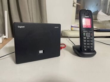 оборудование для ip телефонии германия настенные: IP-телефон Gigaset A510 В комплекте: Трубка с зарядной станцией