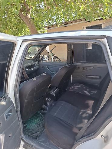 Daewoo: Model: Daewoo Nexia sedan Kuzov: 4 qapılı, ağ rəng Yanacaq: Benzin — 16