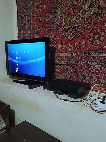 plesteyşin: Sony PlayStation 3 (PS3) Slim oyun konsolu idial veziyete ustunde 2 — 3