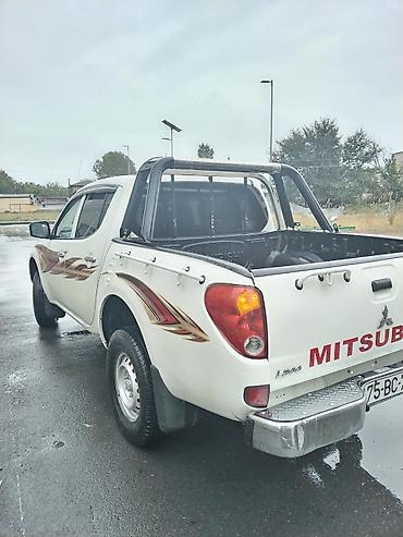235 55 18: Mitsubishi L200: 2.4 l | 2008 il 302118 km Pikap — 2