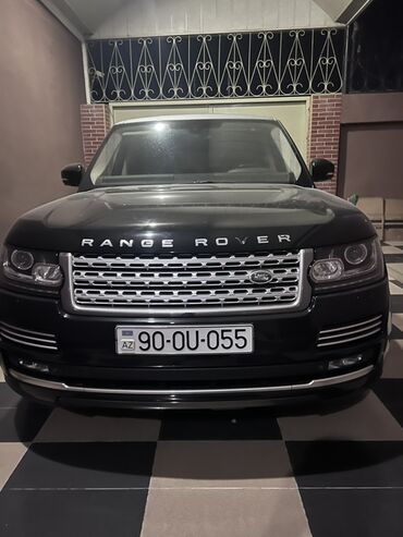 qazel ucuz: Qara rəngdə olan Range Rover avtomobili. Avtomobilin ön hissəsində