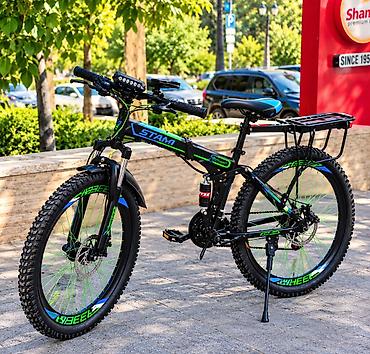 27 5 velosiped: Dağ velosipedi – tam aksesuarli Xüsusiyyətlər: - 26 düym təkərlər — 3