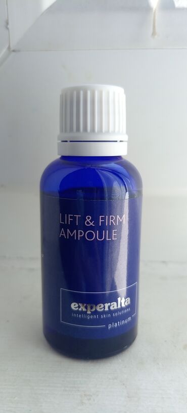 Experalta Platinum Lift & Firm ampula u plavoj staklenoj bočici sa