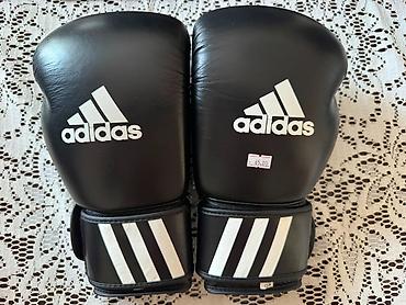 İdman və istirahət: Adidas markalı, qara rəngdə tam dəri boks əlcəkləri satılır. Tam — 3