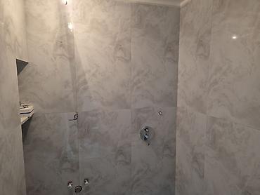 Təmir işləri: - Daxili dizayn: açıq-boz və ağ tonlarda müasir üslub, hamar divar — 22