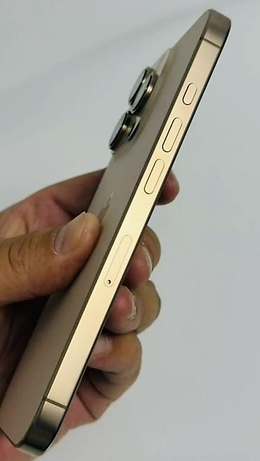 телефон для авто: Смартфон Apple iPhone Pro в золотистом цвете. Корпус выполнен в — 2