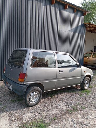 corolla runx: Daihatsu Cuore: 1992 г., 1.2 л, Механика, Бензин, Купе