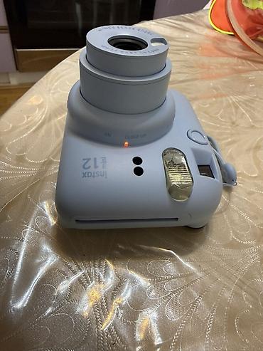 mini kalonka: Fujifilm Instax Mini 12 – mavi rəngdə ani fotoaparat Xüsusiyyətlər: - — 3