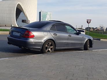 c55 amg: Mercedes-Benz E 320: 3.2 l | 2003 il Sedan — 2
