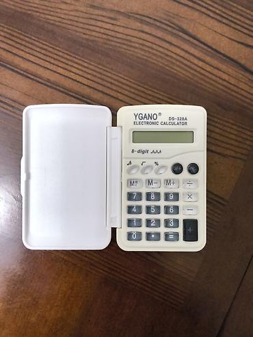 ofis ucun: Deli D82ES Plus elmi kalkulyator Yenidir. 55 manat alınıb. üzərində — 2