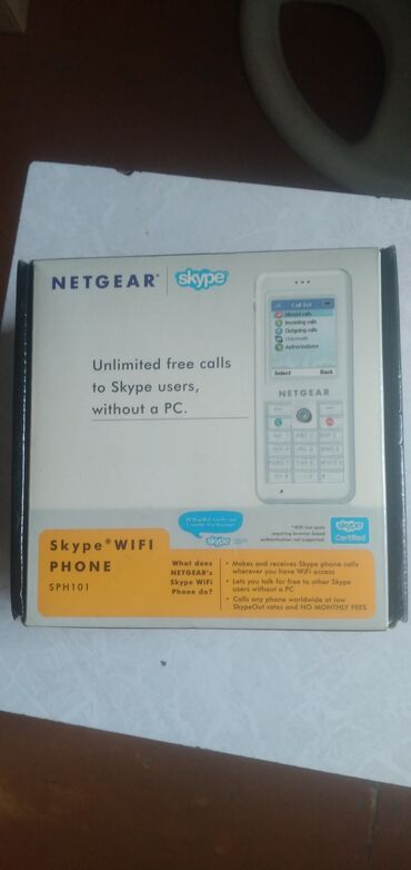 telefon bakı: Телефон Netgear SPH 101 Wi-Fi Skype. Выпущен в августе 2006 года в