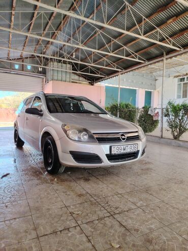 Opel: Opel Astra H hatchback – gümüş rəng. Əsas xüsusiyyətlər: 2006 furqon — 4