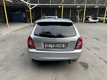 Mazda: Mazda 323: 2004 г., Хэтчбэк — 4