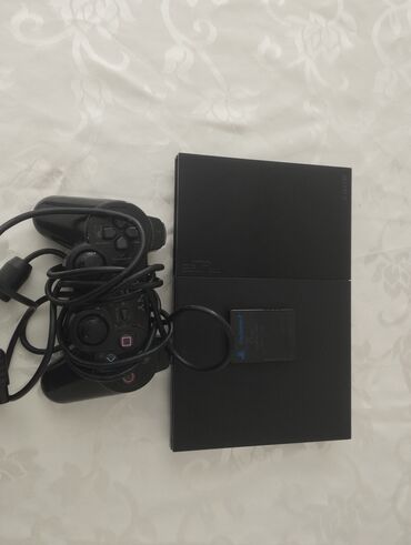 ps rolu: PlayStation 2 slim model.1 pult ve 8mb memory card ilə.Barter olunur