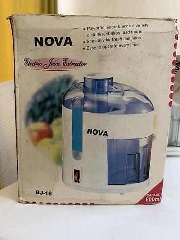 Техника и электроника: Соковыжималка NOVA BJ-18 (Electric Juice Extractor) - Объем: 600 мл — 1
