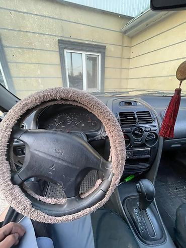 панель камри 35: Mitsubishi Carisma: 1997 г., 1.8 л, Автомат, Бензин, Седан — 4