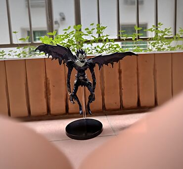Heykəlciklər: Ölüm qeydindən Ryuk fiquru. Detallı dizaynı və qanadları ilə