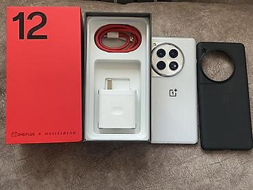 мишь: OnePlus 12, Б/у, 256 ГБ, цвет - Белый, 1 SIM, 2 SIM, eSIM — 1