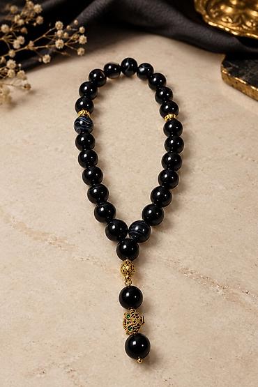 qara sumka: Qara əqiq təsbeh.
Qaşın ölçüsü 12 mm — 2