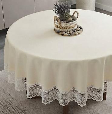 Okrugli stolnjak sa čipkastim ivicama - Elegantni okrugli stolnjak u