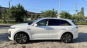 byd e1: Lixiang L6: 2024 г., 1.5 л, Гибрид, Кроссовер — 4