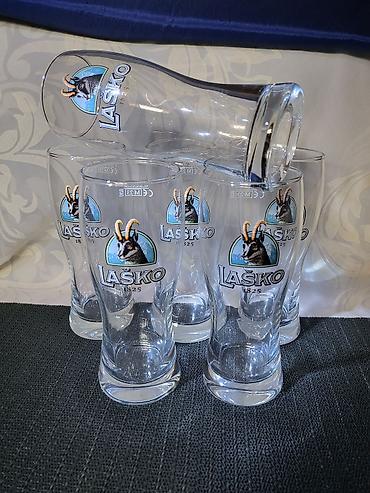 Čaše: Case nove za Lasko pivo. Nove case za pivo sve na njima odsjaj od — 5
