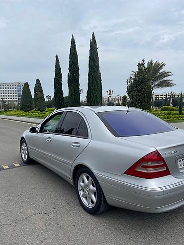 99 maşını: Mercedes-Benz 240: 2.4 l | 2000 il Sedan — 7