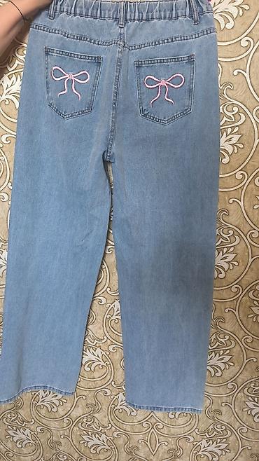 Cinslər: Məhsul: Qadın üçün denim şalvar - Rəng: Açıq mavi (light wash) - Arxa — 2