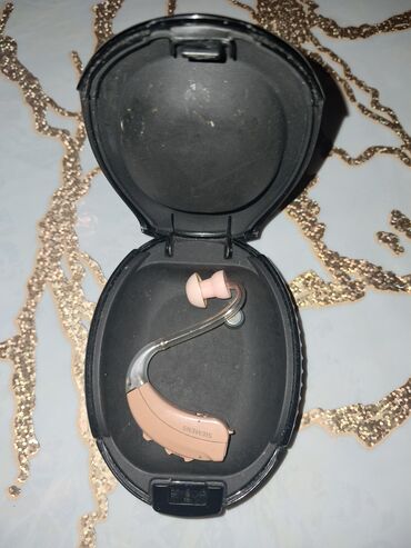 Nitril əlcəklər: Siemens qulaqlıq aparatı (eşitmə cihazı) – arxadan qulağa taxılan