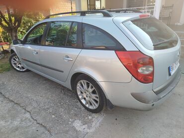 polovni automobili backa topola: Renault Laguna karavan, srebrne boje, sa krovnim nosačima. Poseduje