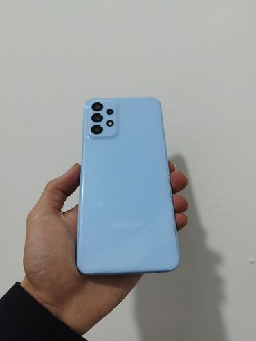 chekhol samsung i9100: Samsung Galaxy A23, 64 ГБ, цвет - Голубой, Кнопочный, Отпечаток пальца