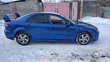 Другие детали салона: Mazda Atenza (правый руль) — интерьер - Салон бежево‑черный, тканевые — 6