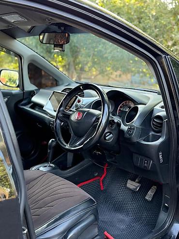Honda Fit: 2009 г., 1.3 л, Автомат, Бензин, Хэтчбэк — 7