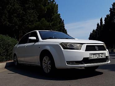 turbo az uvaz: Ağ rəngli sedan avtomobil Xarici: - Ağ gövdə, arxa park sensorları - — 6