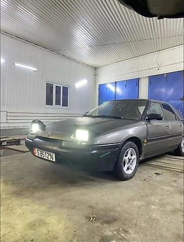 коврик бу: Mazda 323: 1991 г., 1.8 л, Механика, Бензин, Хэтчбэк — 3